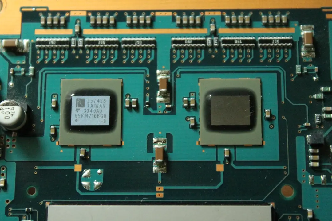 A picture of two small shiny chips.