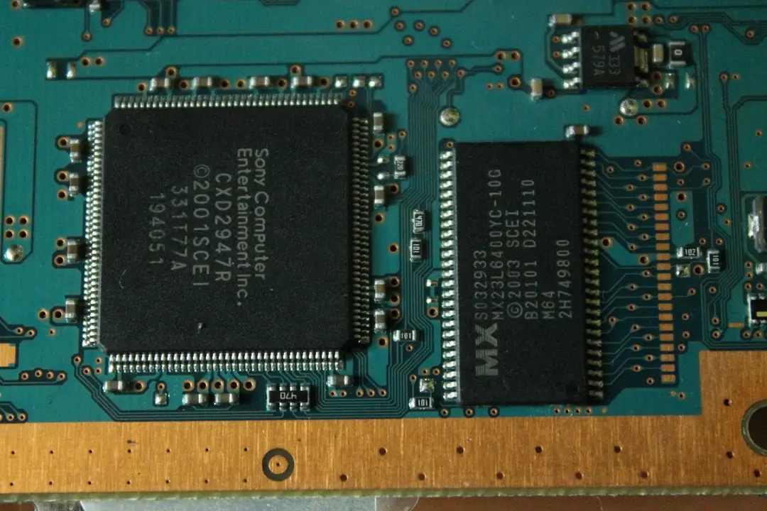 A picture of two black chips; one is square and the other rectangular (TSOP).